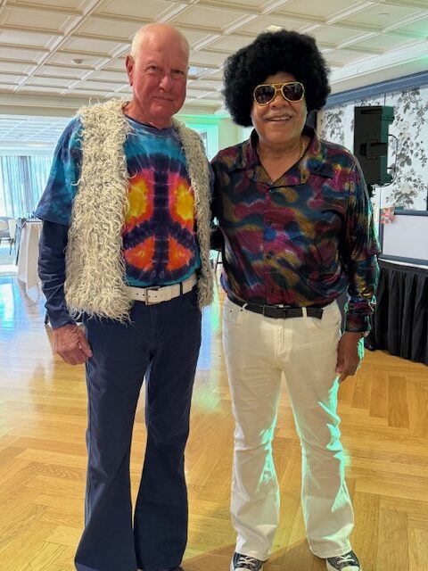 Todd Compton of Compton Wealth Financial Advisors poses in costume at a Halloween Community Event