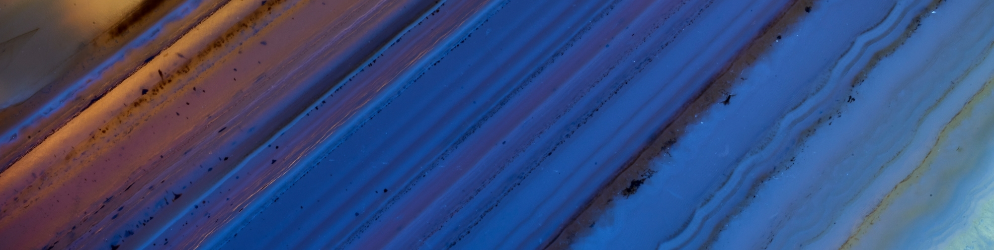 a blue background pattern for the Compton Wealth Management Financial Insights page