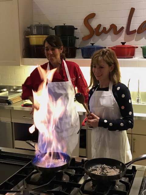 2 students at a Compton Wealth cooking class event